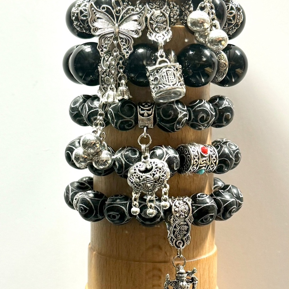 Elegant Black and Silver Charm Bracelet